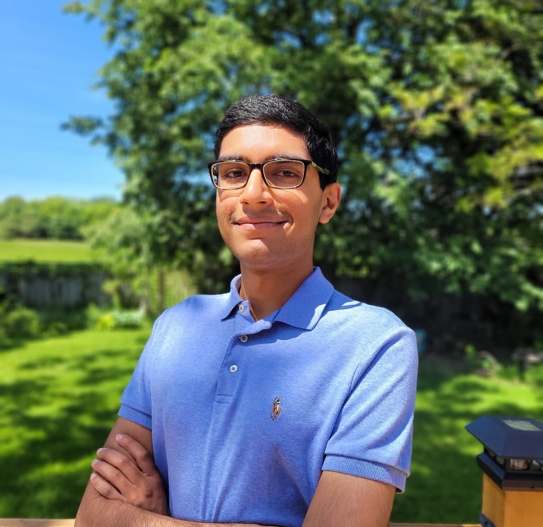 A picture of Tanuj posing outside