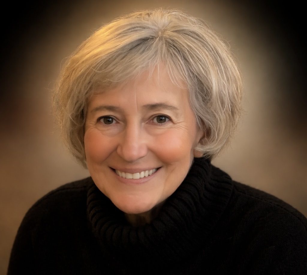 A photo of Janice smiling.